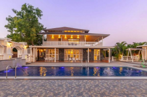 StayVista's Lake La Vie - Tranquil Lake-View Villa Amidst Farmland with Pool and Poolside Gazebo - Proximity to Sula